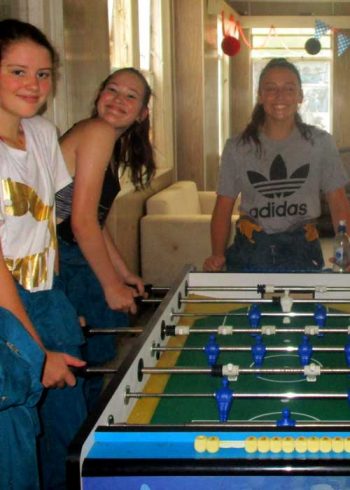 GOTCHA-Asylum-Paintball-Happy-Girls-Playing-Table-Hockey