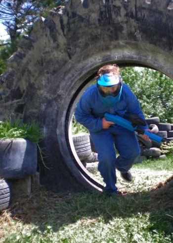 Gotcha-Asylum-Paintball-Cool-Boy-Running-Through-A-Massive-Tyre