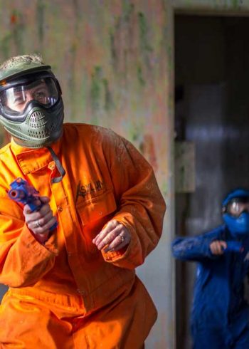 Low-Impact-Asylum-Paintball-A-Boy-In-Blue-Playing-Together-With-Grandmother