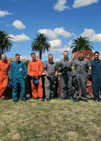 Classic-Asylum-Paintball-Group-Of-Men-Having-Fun-Laughing-Masks-In-Hands-LQ-500-700